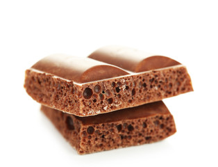 Tasty porous chocolate, isolated on white