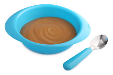 Baby food in bowl isolated on white