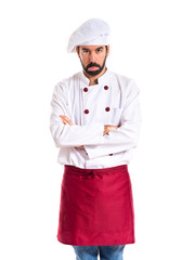 Sad chef over white background