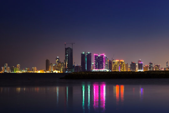 Night modern city skyline at night, Manama, Bahrain