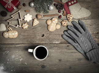 Christmas decorations, home made ginger bread and woman's hand o