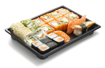 Fototapeta na wymiar Set of sushi in black plastic box