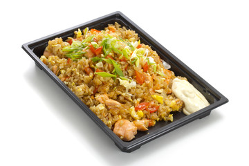 asian rice with meat in plastic box
