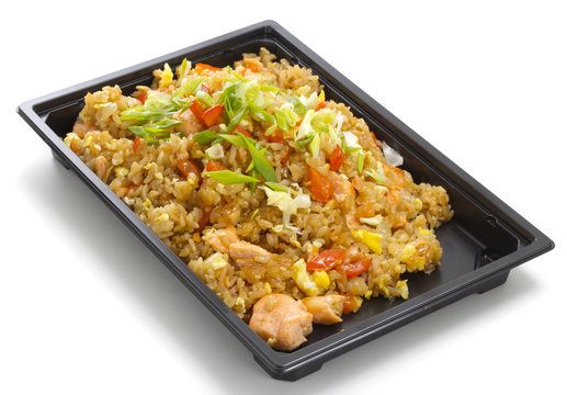 asian rice with meat in plastic box