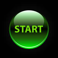 Green glossy start button on black