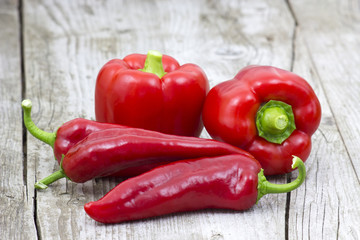 red peppers on wooden background