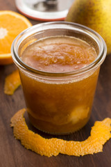 glass of pear jam with orange