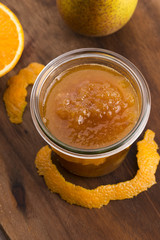 glass of pear jam with orange