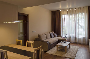 Living room with dining-table in renovated apartment in Sofia