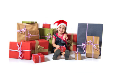 christmas kid with several presents 