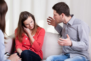 Screaming husband and wife during psychotherapy