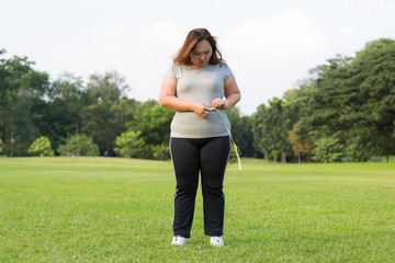 obese women is worrying about her overweight