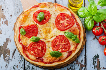 pizza with mozzarella and tomatoes