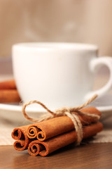 Cinnamon and beverage cup on wooden table series - 6