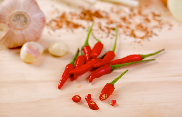 Red hot chilli peppers on a board