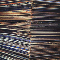 stack of vinyl records in envelopes