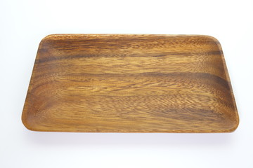 Brown wood plate isolated on white background