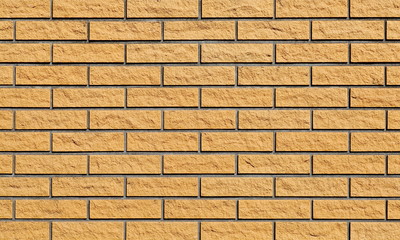 Old yellow brick wall background and texture