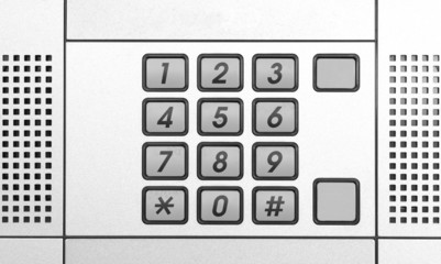 Security intercom number keypad at apartment door