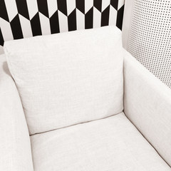 Stylish white armchair