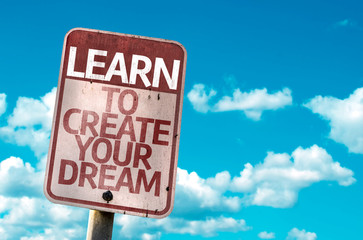 Learn To Create Your Dream sign with sky background