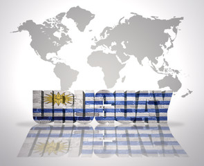 Word Uruguay on a world map background