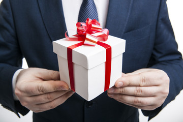 man gives gift box