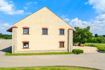Fototapeta premium Historic building in Paczultowice village in summer, Poland