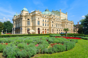 Fototapeta premium Green park in front of Slowackiego Theater in Krakow, Poland