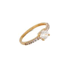 Gold ring with a brilliants on a white background