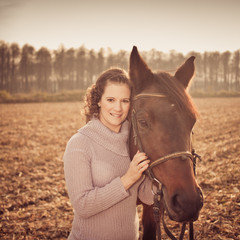 Fototapeta premium beautiful woman with horse