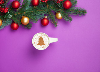 cappuccino and christmas gifts with pine branch on violet backgr