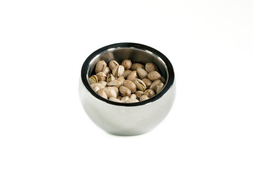 pistachios in silver bowl