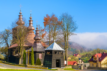 Wooden church in Banica village, Beskid Niski Mountains, Poland - obrazy, fototapety, plakaty