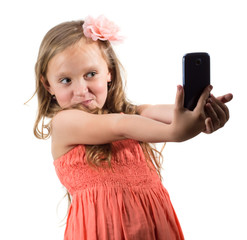 Little girl doing photo of her self