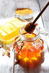 Fresh honey on wooden table