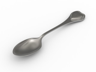 Silver spoon with heart emblem on handle