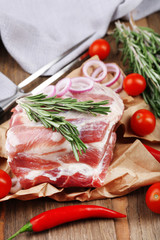 Raw meat on wooden table, close-up