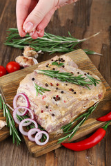 Raw meat on wooden table, close-up
