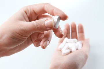 Pills in hand, close-up