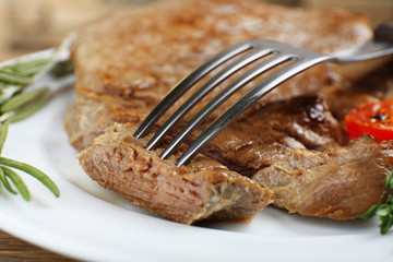 Delicious grilled meat on table, close-up