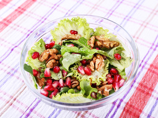 Fresh salad with greens, garnet and spices