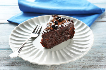 Yummy chocolate cake served on table, close-up