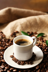 Cup of coffee on wooden table