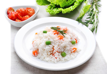 Vegetable rice served on table, close-up