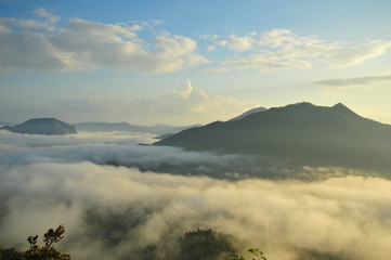Mountain Landscape Above the Clouds at Sunrise