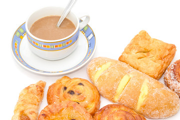 Variety of bread with coffee on white background