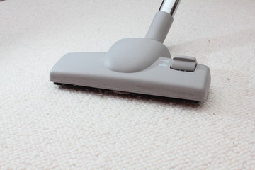 Vacuum cleaner on carpet or flor