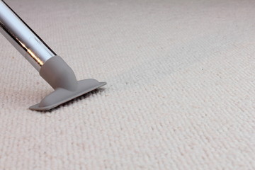 Vacuum cleaner on carpet or floor