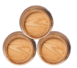 three wood casks on white
